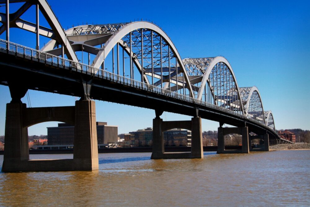 Metal bridge spanning water