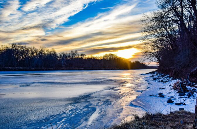 winter lakeside scene at sunset