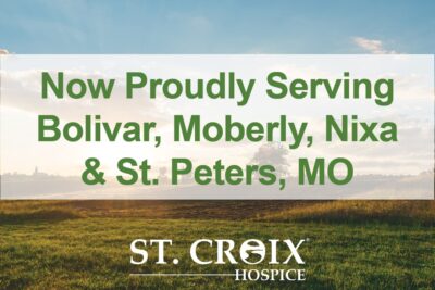 Text informing that St. Croix Hospice now serves Missouri area with green and yellow fields in the background