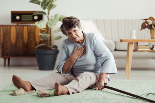 Hospice patient sitting on the floor