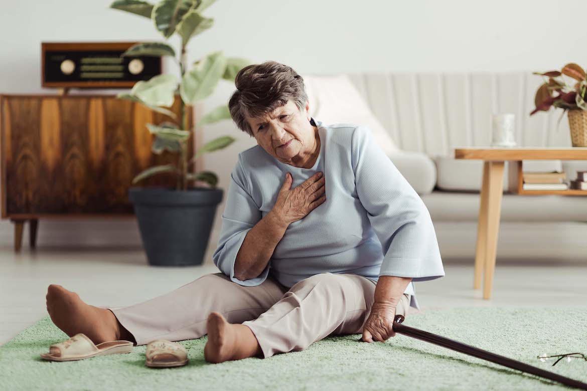 Hospice patient sitting on the floor