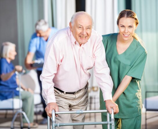 Hospice patient walking with nurse