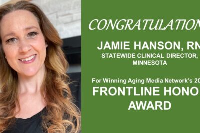 Woman smiling at camera with text on the side that congratulates her for her honor award