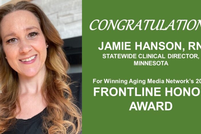 Woman smiling at camera with text on the side that congratulates her for her honor award