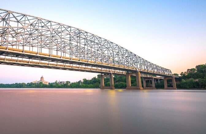Bridge crossing Missouri river on the background
