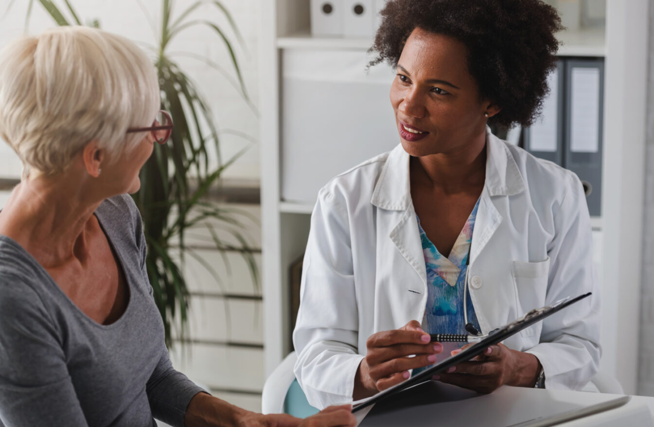 Senior female patient with female doctor at doctor's appointment